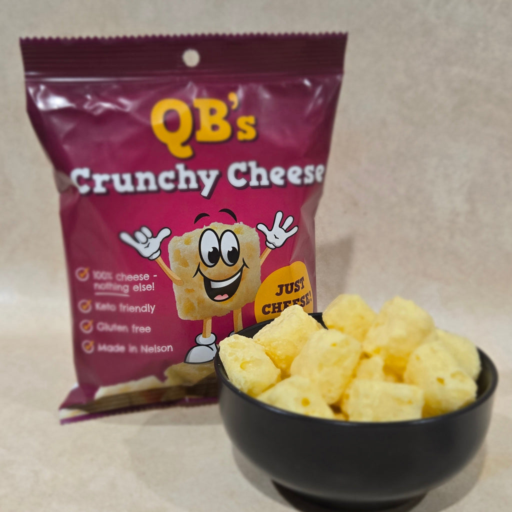 A 40g serving of QB’s Crunchy Cheese with the product packaging, perfect for gluten-free and low-carb snacking.